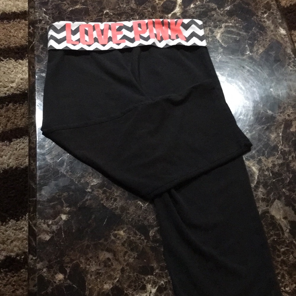 Pink yoga shorts in the color black